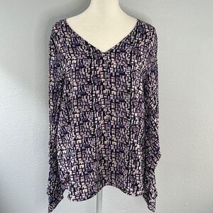 DKNY geometric blouse. NWT. Size Medium.  Unique scalloped and gathered sleeves.